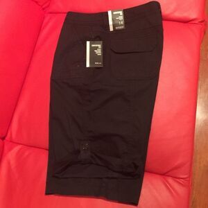 Black shorts with button on sides.